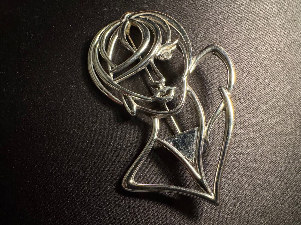 JJ Brooch of Large Woman w/ Crystal Eye Silver Tone